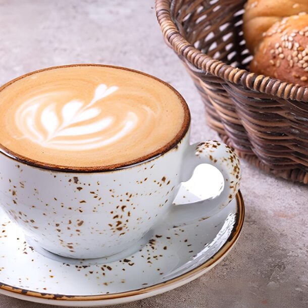 Cup of Turkish tea with sesame simit bread